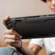 Juodas dėklas Nintendo Switch 2 žaidimų kompiuteriui "Spigen Rugged Armor"