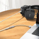 Auksinės spalvos Aux USB-A - 3.5mm adapteris "Hoco UPA32D"